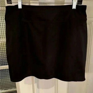 Tangerine athletic skort black with built in shorts. Back waist zip size Large